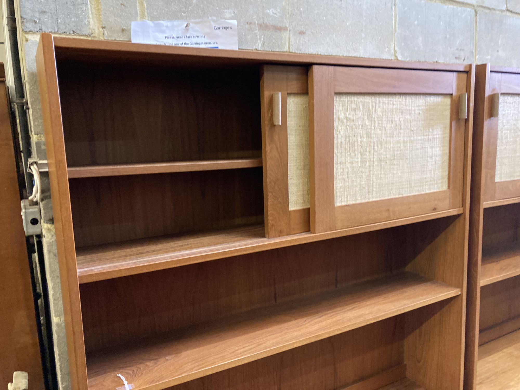 Three near-matching teak side cabinets,
